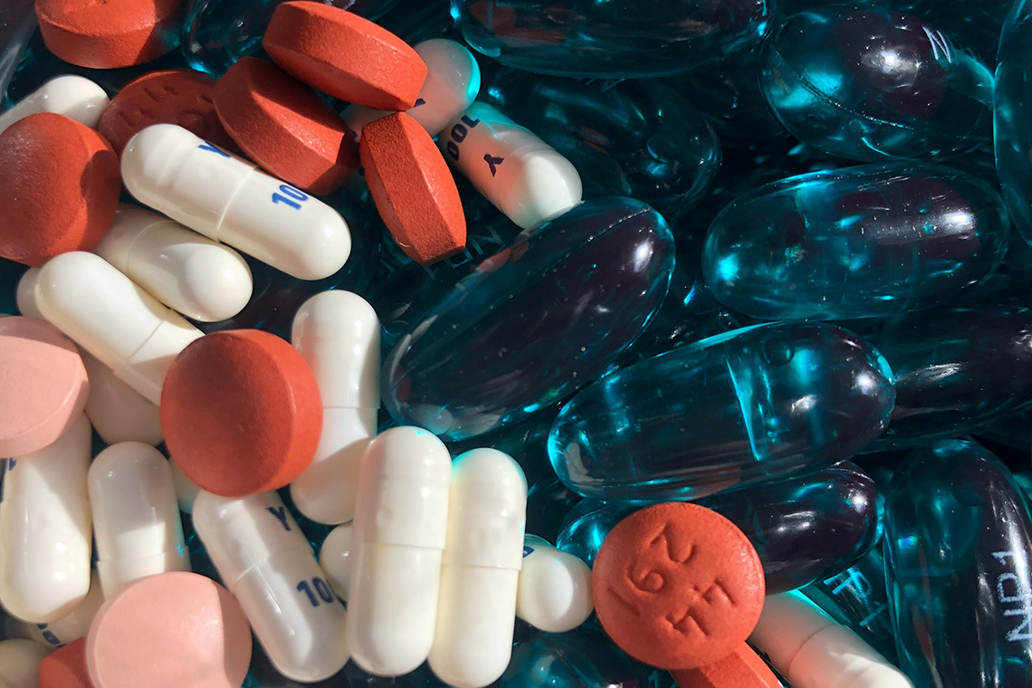a macro image of tablets of different shapes and colors