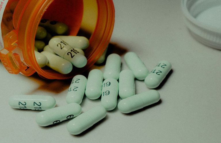 The pills scattered on the table