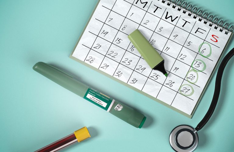 A calendar with marked days of the week is on the table.