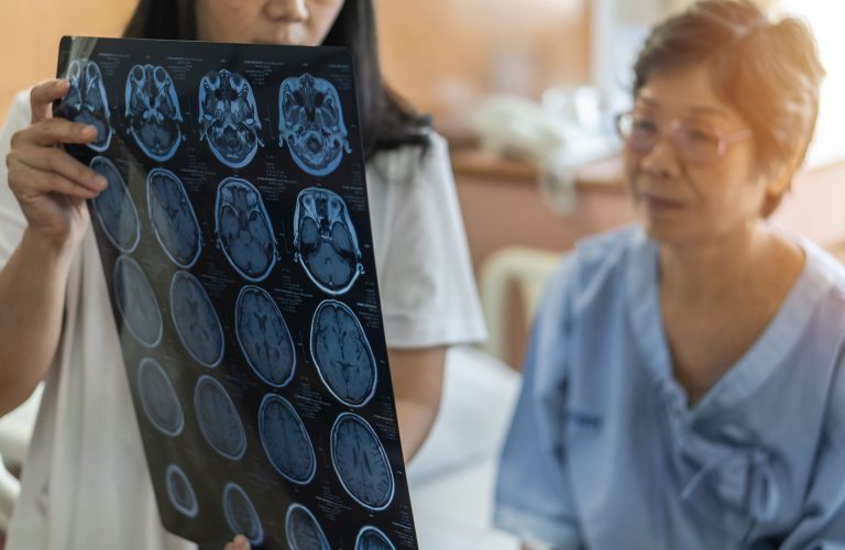 Brain disease diagnosis with medical doctor diagnosing elderly a
